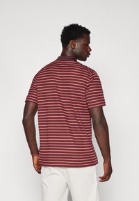 Nike Golf DRI-FIT VICTORY - Polo - burgundy crush/dragon red/white
