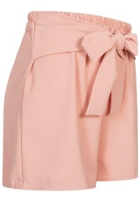 Shorts roses en tissu doux, dotés d'une taille élastique et d'un nœud noué à l'avant, avec des poches latérales et une coupe décontractée.