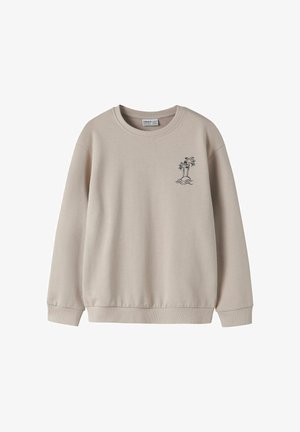 Beżowa bluza z okrągłym dekoltem, długimi rękawami i prążkowanymi ściągaczami. Na piersi znajduje się mały nadruk z motywem palm i fal.