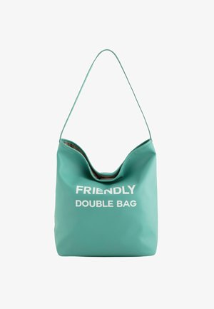 Turkusowa, teksturowana torba podwójna z szerokim otwarciem i pojedynczym paskiem na ramię, z napisem "PRZYJAZNA TORBA PODWÓJNA" wydrukowanym na białym tle.