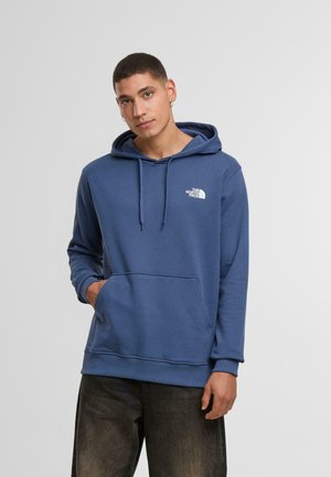 Blue cotton hoodie with a kangaroo pocket, adjustable drawstring hood, and white logo on the chest. Features ribbed cuffs and hem.