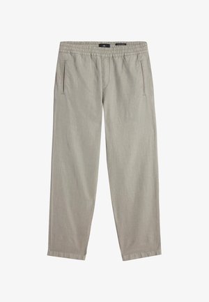 Jasnoszare, luźne spodnie z elastycznym pasem i dwoma bocznymi kieszeniami. Gładka tekstura i lekko zwężane nogawki.