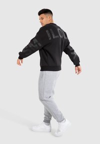 Smilodox UNISEX BRAIL SOLID - Felpa - schwarz