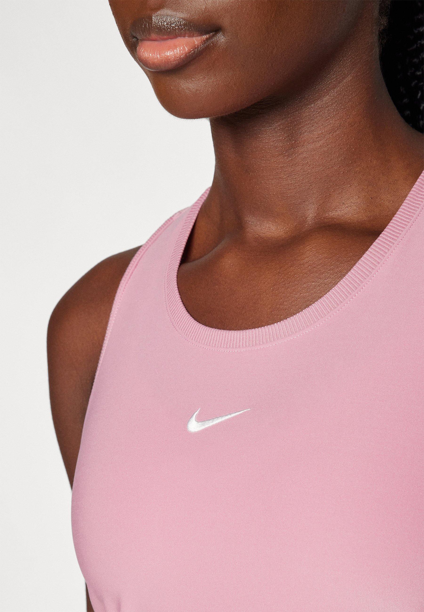 light pink nike tank top