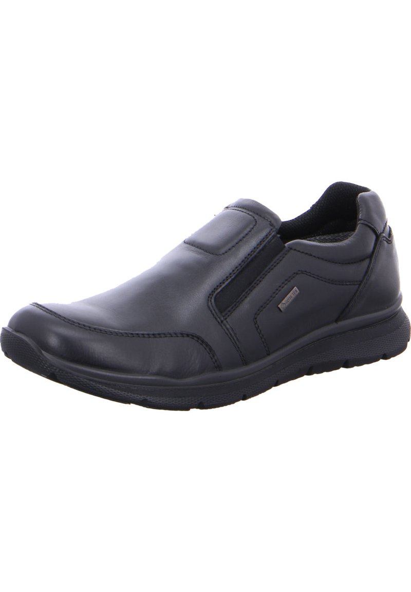 Schwarzer Leder-Schlüpfschuh mit elastischen Seitenteilen, abgerundeter Zehenpartie und strukturiertem Gummisohle. Verfügt über Nähte und ein minimalistisches Design.