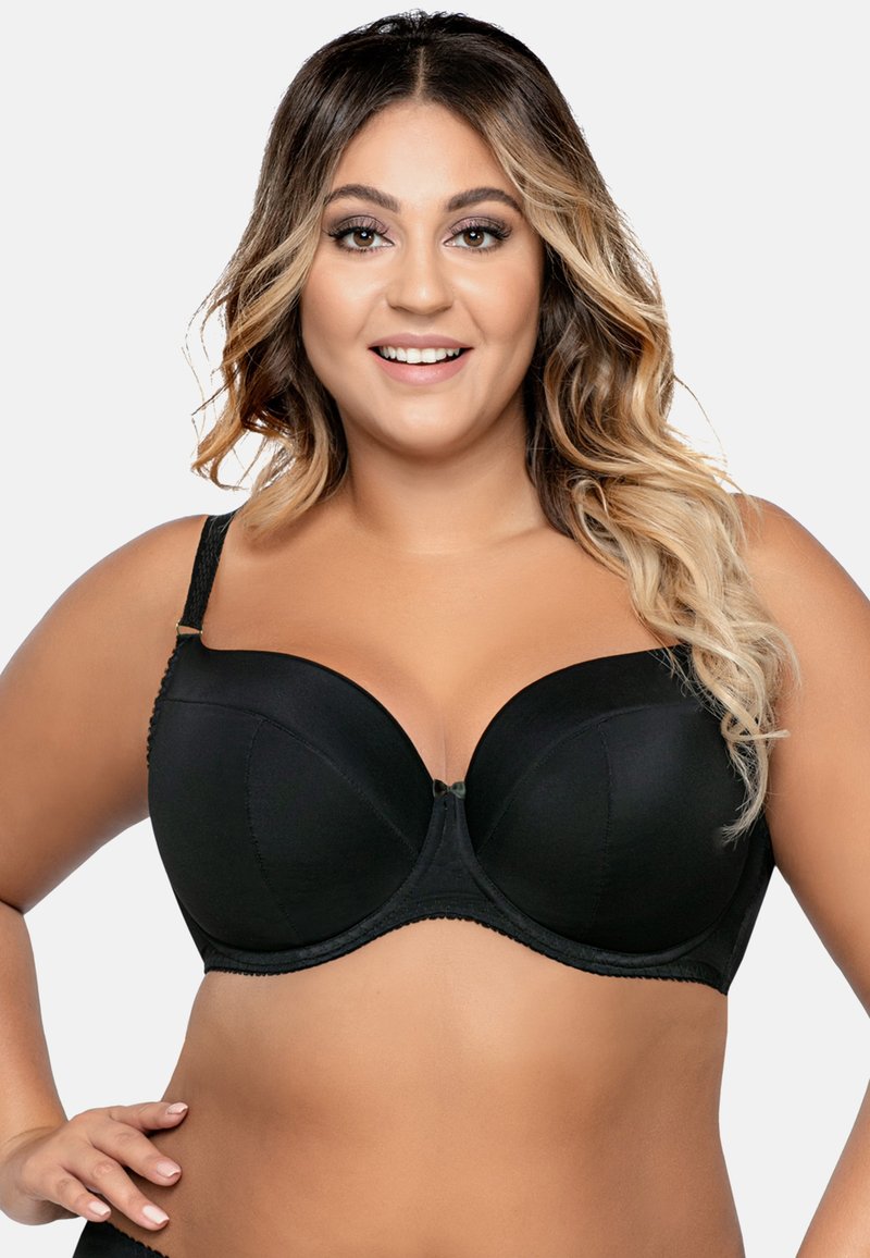 Reggiseno nero con ferretto, realizzato in tessuto liscio, con coppe senza cuciture, spalline regolabili e un bordo decorativo lungo i bordi.