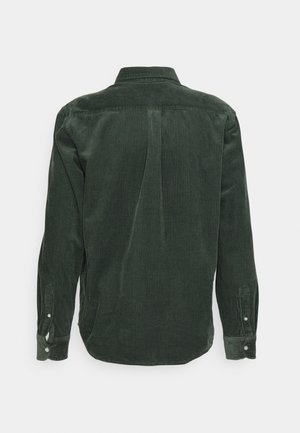 Mørkegrøn fløjlsbluse med lange ærmer og knaplukning ved manchetterne, vist bagfra på en ensartet lys baggrund.