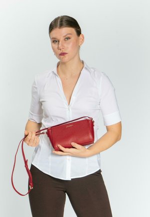 BOLOGNA - Cross body bag - red