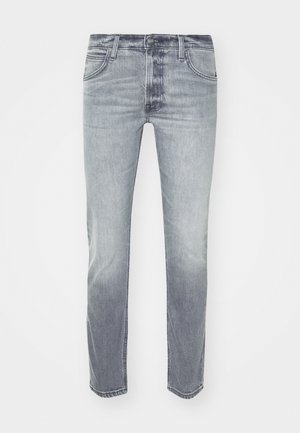 Grå denimjeans med en lätt blekning, med femficksdesign, dragkedja och rak benform. Slät textur och minimal sömdetalj.