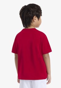 Jordan JUMPMAN AIR  - Lihtne T-särk - gym red