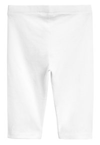 Leggings bianchi in cotone con cintura elastica, caratterizzati da una texture liscia e orli cuciti senza soluzione di continuità, progettati per comfort e facilità di indossamento.