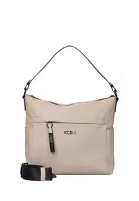 Bolso de hombro de nailon beige con acentos negros, correa ajustable, cierre de cremallera en la parte superior y detalle del logo KCB en la parte frontal.