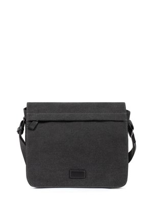 Sac messager en toile noire avec rabat avant, bandoulière réglable et patch logo rectangulaire discret centré à l'avant.