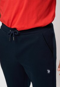 U.S. Polo Assn. Spodnji deli trenirk - dark sapphire