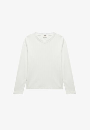 Hvid langærmet skjorte med ribbet tekstur og V-udskæring med blondekant. Har en afslappet pasform og lige kant.
