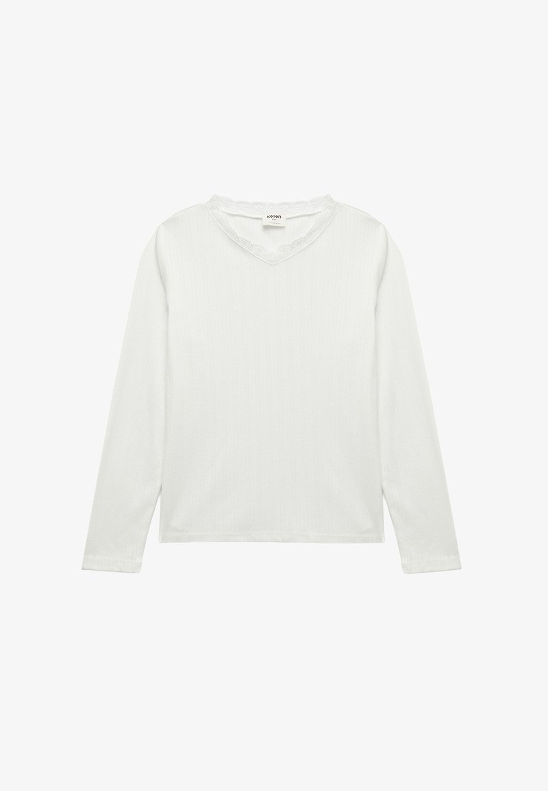 Witte lange mouw shirt met een geribbelde textuur en een V-hals met kantafwerking. Heeft een ontspannen pasvorm en een rechte zoom.