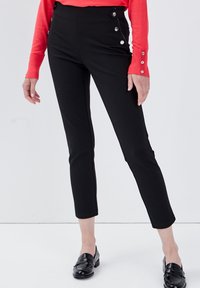Breal MIT GEKIPPTER TAILLE - Broek - noir