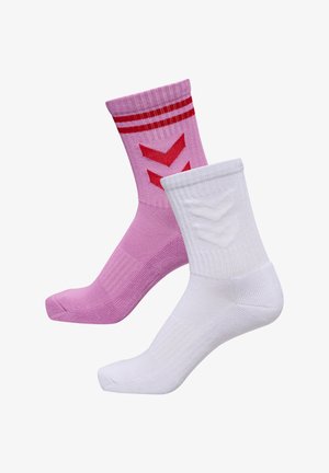 Rose pink sock with red stripes and chevron pattern, paired with a textured white sock featuring a subtle chevron detail.
