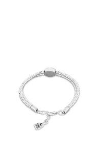 Pulsera de plata con eslabones redondeados y perlados, con un cierre ovalado liso y una pequeña placa con la inscripción "UNO 647".