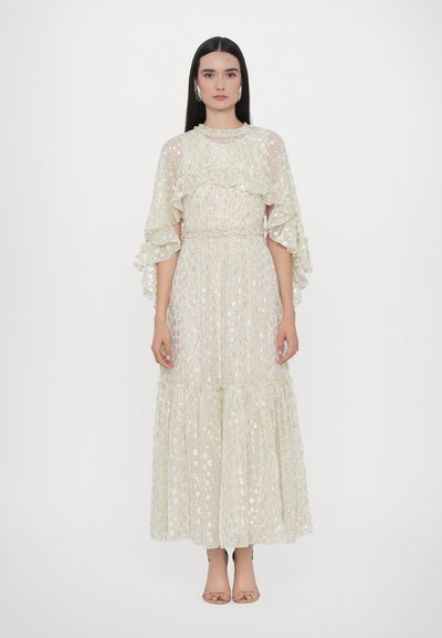 Long, light ivory dress with ruffled sleeves, textured fabric, and floral patterns. Features a gathered waist and layered bottom.