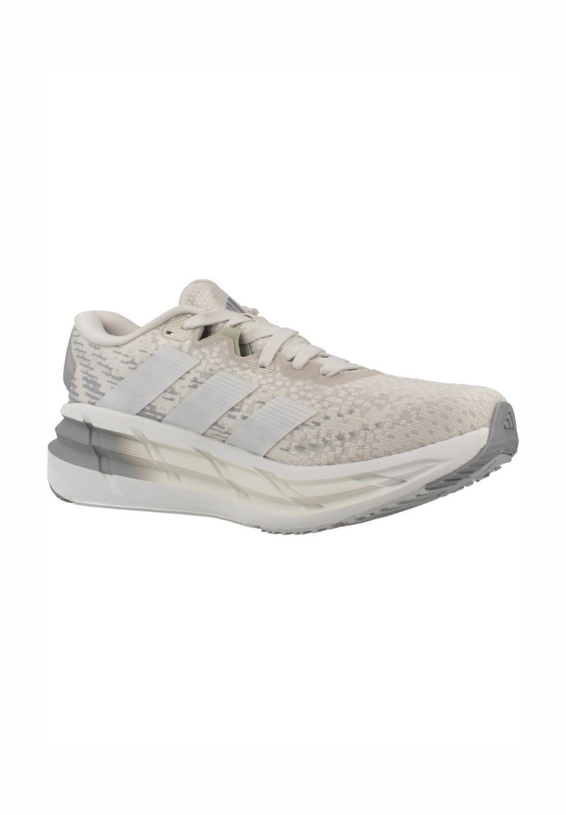 Light gray athletic shoe with a textured knit upper, white three-stripe design, padded tongue, and dual-tone midsole for cushioning.