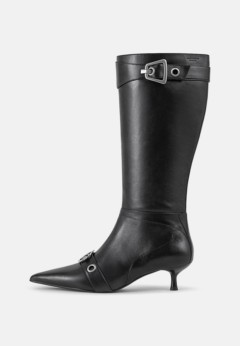 Knee-high black leather boot with a pointed toe, thin heel, buckle accents at the top and midfoot, smooth texture, and sleek silhouette.