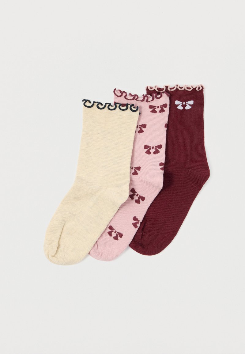 Três pares de meias de lã: bege, rosa com padrão floral e burgundy. Cada par possui um punho decorativo em formato de onda. Textura suave.