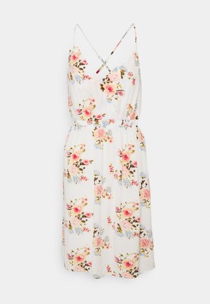 Blommig midiklänning med vit bottenfärg, spaghettiband, v-ringning, elastisk midja och ett mönster av rosa och blå blommor. Lättviktsmaterial.