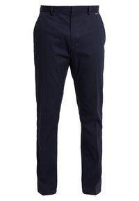 Marinblå skräddarsydda byxor gjorda av lättviktsmaterial, med slät front, sidofickor och en subtil logotyp på midjebandet.