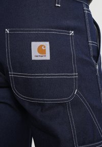 Carhartt WIP RUCK SINGLE KNEE PANT - Calças de ganga de perna direita - blue rigid