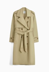 Béžový trench coat vyrobený z bavlněné směsi, s dvouřadovým zapínáním, páskem na zavazování a ramenními epauletami. Hladká textura a délka po kolena.