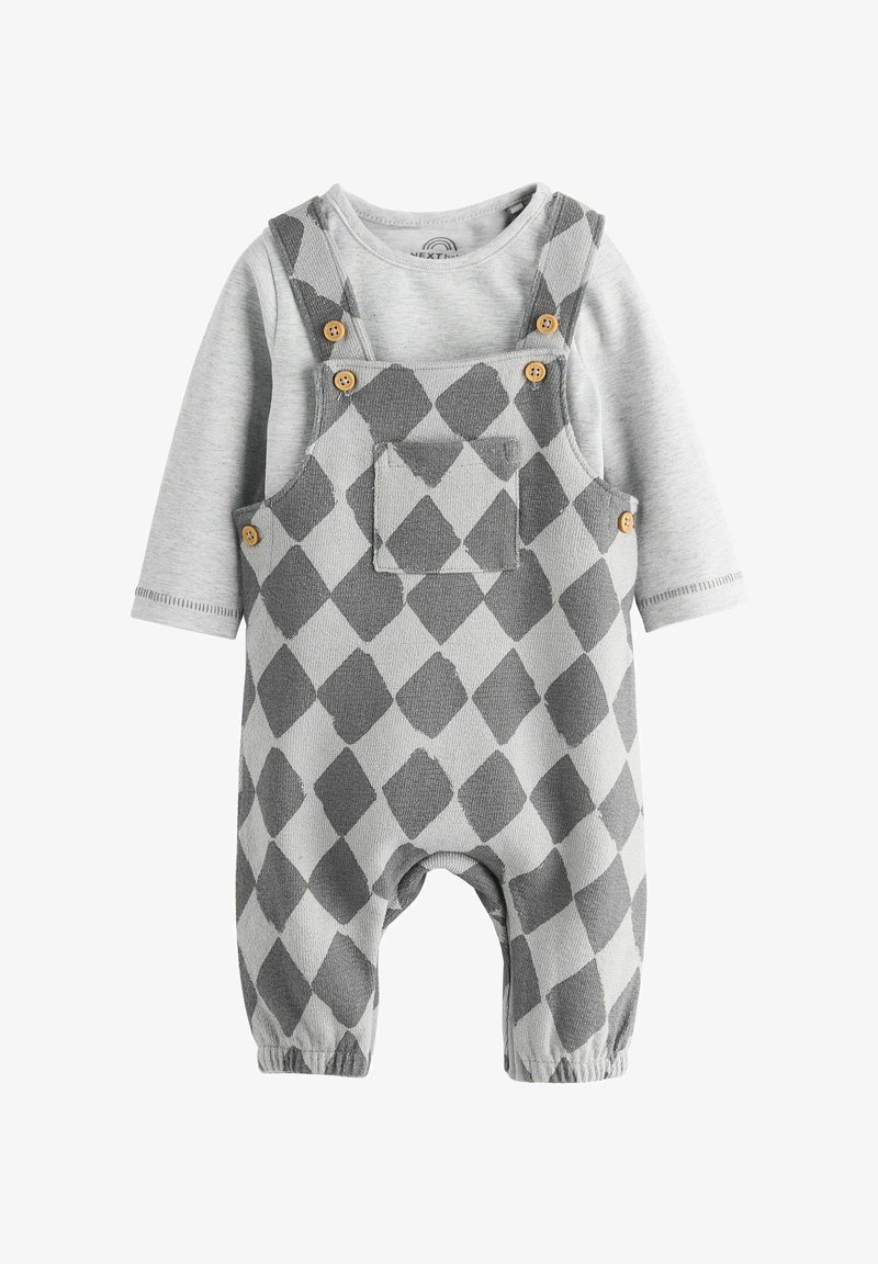 Gray and light gray overall with diamond pattern, featuring wooden buttons, front pocket, and elasticized cuffs. Long-sleeve shirt underneath.