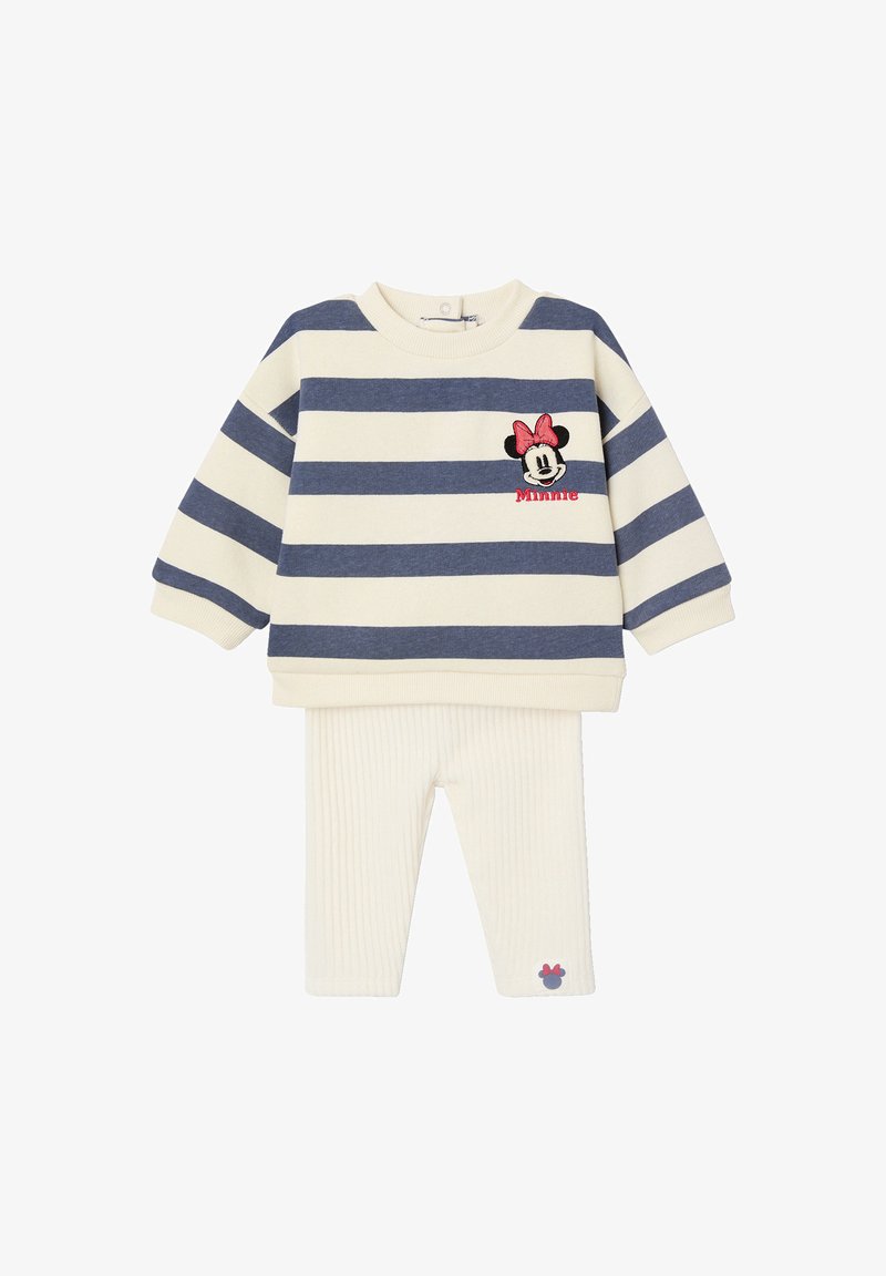 Gestreifter Pullover in Creme und Dunkelblau mit einem gestickten Minnie Maus Design; kombiniert mit cremefarbenen, gerippten Leggings, die ein kleines Detail aufweisen.