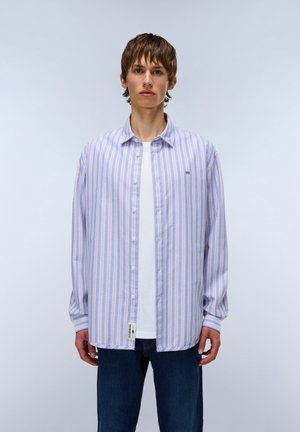 Lightweight, long-sleeve shirt with purple and white vertical stripes, button-down front, and a small logo on the chest. Plain white T-shirt underneath.