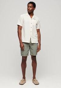 Superdry & Co DRAWSTRING - Pantalones deportivos - grau grun