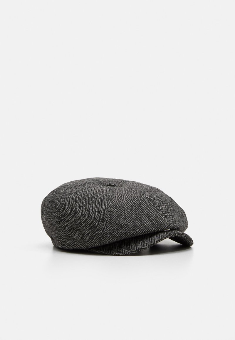 Gray herringbone flat cap made from textured fabric, featuring a rounded top, two front panels, and a sewn-down brim.
