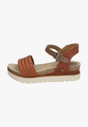 Brown leather wedge sandal with woven strap detail, adjustable ankle buckle, textured cork platform, and cream rubber sole.