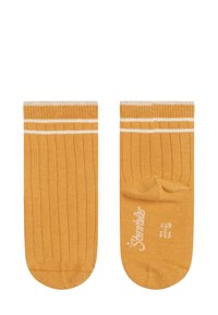Gelbe gerippte Socken mit einem kontrastierenden weißen Doppelstreifen am oberen Rand. Weiche Textur mit einer glatten Oberfläche, die ein kleines Markensymbol zeigt.