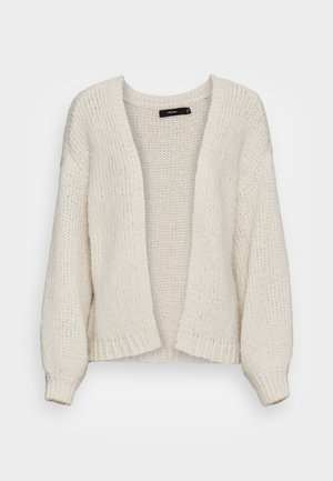 Kremowy, dziany kardigan z otwartym przodem, ściągaczami na mankietach i dole. Tkanina z fakturą, luźny krój, miękkie wykończenie, bez zapięć.