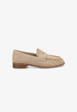 Beige suede penny loafer with low stacked wooden heel and stitched detailing along the toe and vamp.