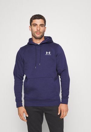 Mørkeblå hoodie med snøre, frontlomme og logo på venstre bryst. Blandingsmateriale af bomuld, ribbede manchetter og kant. Glat tekstur.