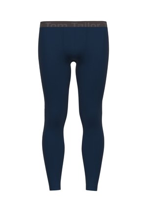 Námornícke modré termo legíny s hladkou textúrou. Vlastnosti: tmavý pás so zvýrazneným nápisom "Tom Tailor". Tvarujúci dizajn pre pohodlie.