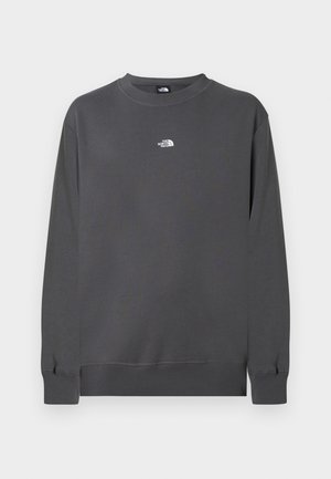 Szara bluza z mieszanki bawełny, z okrągłym dekoltem, długimi rękawami, ściągaczami przy mankietach oraz małym białym logo na piersi.