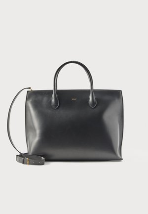 Zwarte leren handtas met twee handvatten, verstelbare schouderband en klein gouden "BALLY" logo aan de voorkant in het midden.