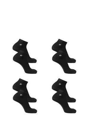 Huit paires de chaussettes noires courtes avec un petit logo blanc sur le côté, disposées en grille sur un fond blanc.