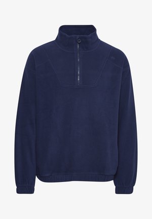 Marineblå fleece pullover med høj krave og halv lynlås. Har et fladt sømdesign og elastiske manchetter for en behagelig pasform.