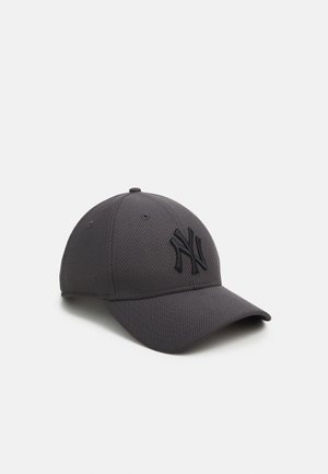 Dark gray cap made of textured material, featuring a raised black New York logo on the front, curved brim, and adjustable back strap.