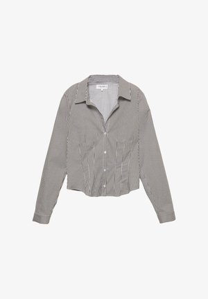 Camicia a maniche lunghe, tagliata, realizzata in tessuto leggero, con righe verticali bianche e nere, colletto a punta.