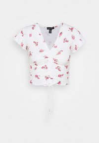Vit kortärmad topp med rosa blommönster, V-ringning, samlad front och justerbar dragsko i nederkant för passform. Texturerat tyg.