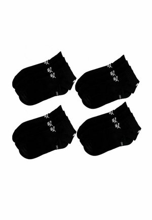 Four pairs of black ankle socks with white Puma logo and size 35 printed on the sides, arranged in pairs on a white background.